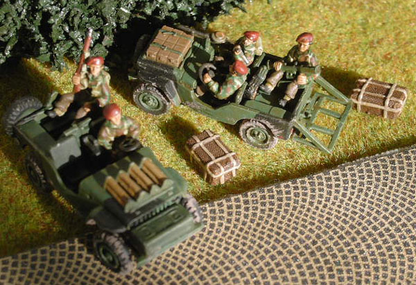 Two parajeeps, with drop crates.