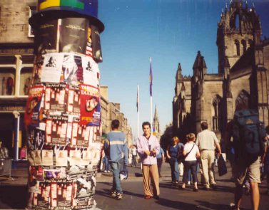 Pillar covered in posters.
